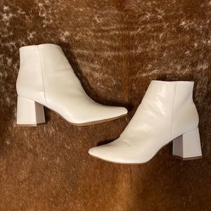 Solid white booties, worn a couple times, super cute and comfy!